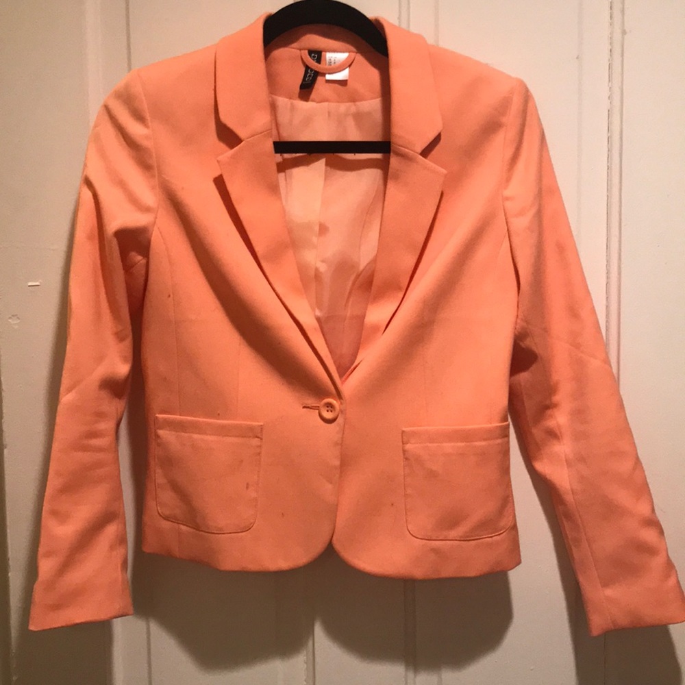 Coral colored business jacket